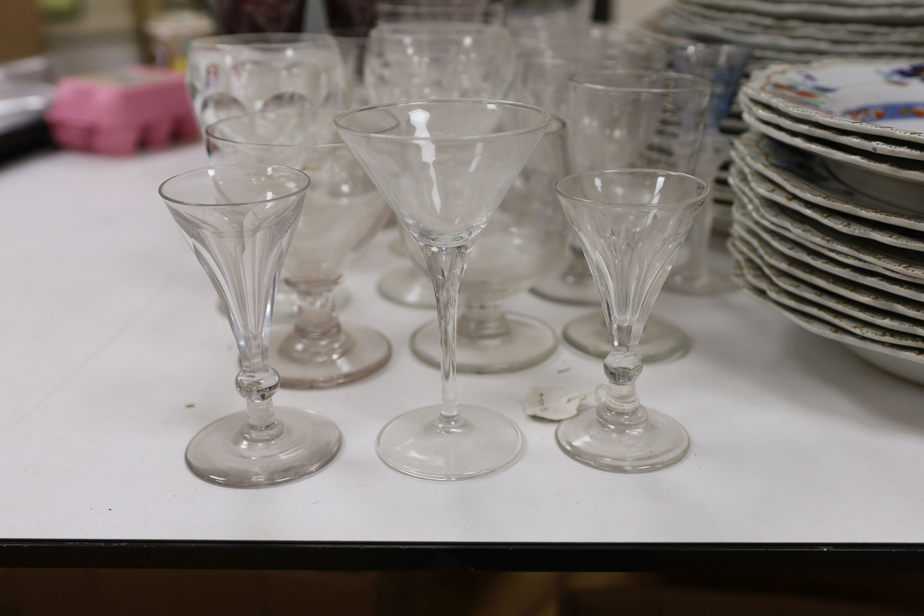 A collection of mostly 19th century rummers and ruby etched glass wine glasses, flutes etc.